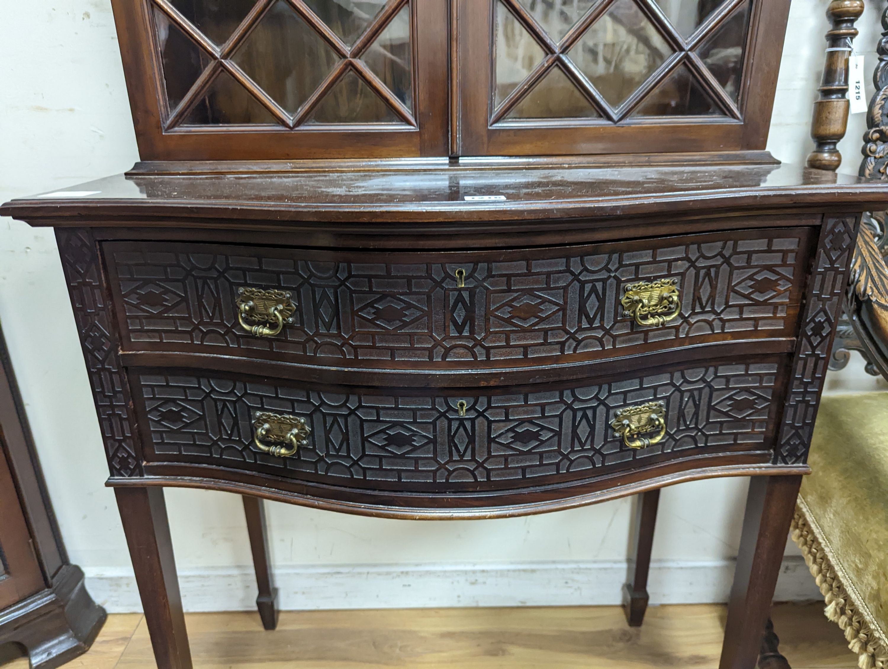 An Edwardian Chippendale revival serpentine mahogany display cabinet, width 76cm, depth 45cm, height 180cm